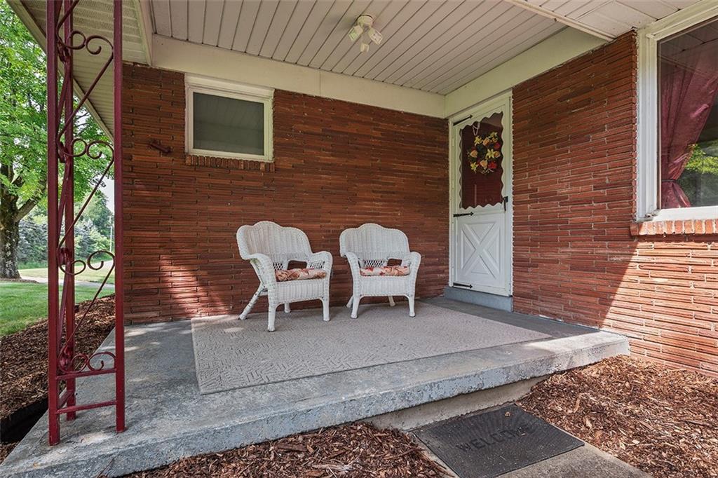 632 Sandy Hill Road Valencia, PA 16059 - Photo 3 of 48 a couple of chairs sitting in backyard of a house