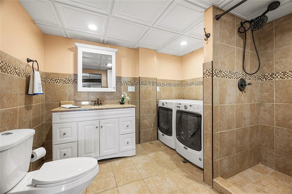 632 Sandy Hill Road Valencia, PA 16059 - Photo 38 of 48 a bathroom with a granite countertop sink toilet and shower