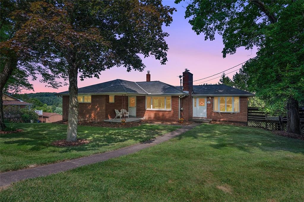 632 Sandy Hill Road Valencia, PA 16059 - Photo 48 of 48 a front view of a house with a yard