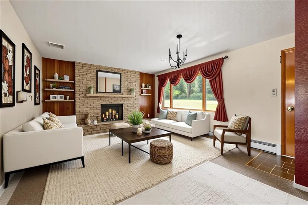 632 Sandy Hill Road Valencia, PA 16059 - Photo 8 of 48 a living room with furniture fireplace and rug