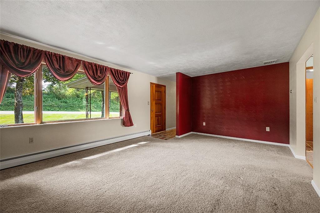632 Sandy Hill Road Valencia, PA 16059 - Photo 10 of 48 a view of an empty room with a window