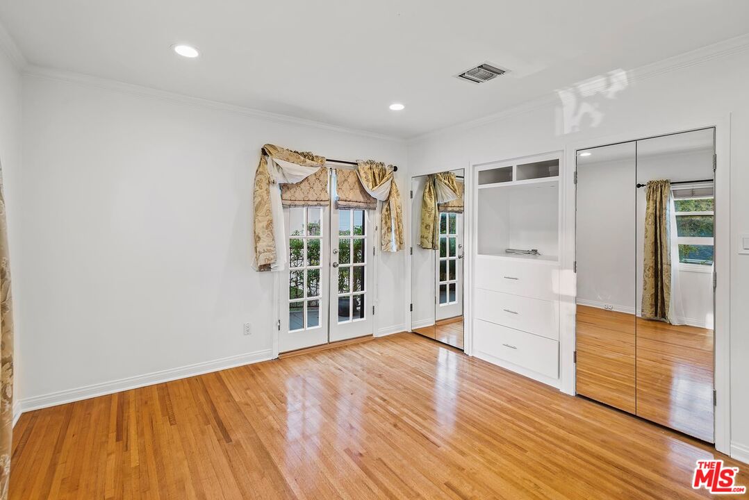 10497 Kinnard Avenue Los Angeles, CA 90024 - Photo 13 of 19 a view of empty room with wooden floor