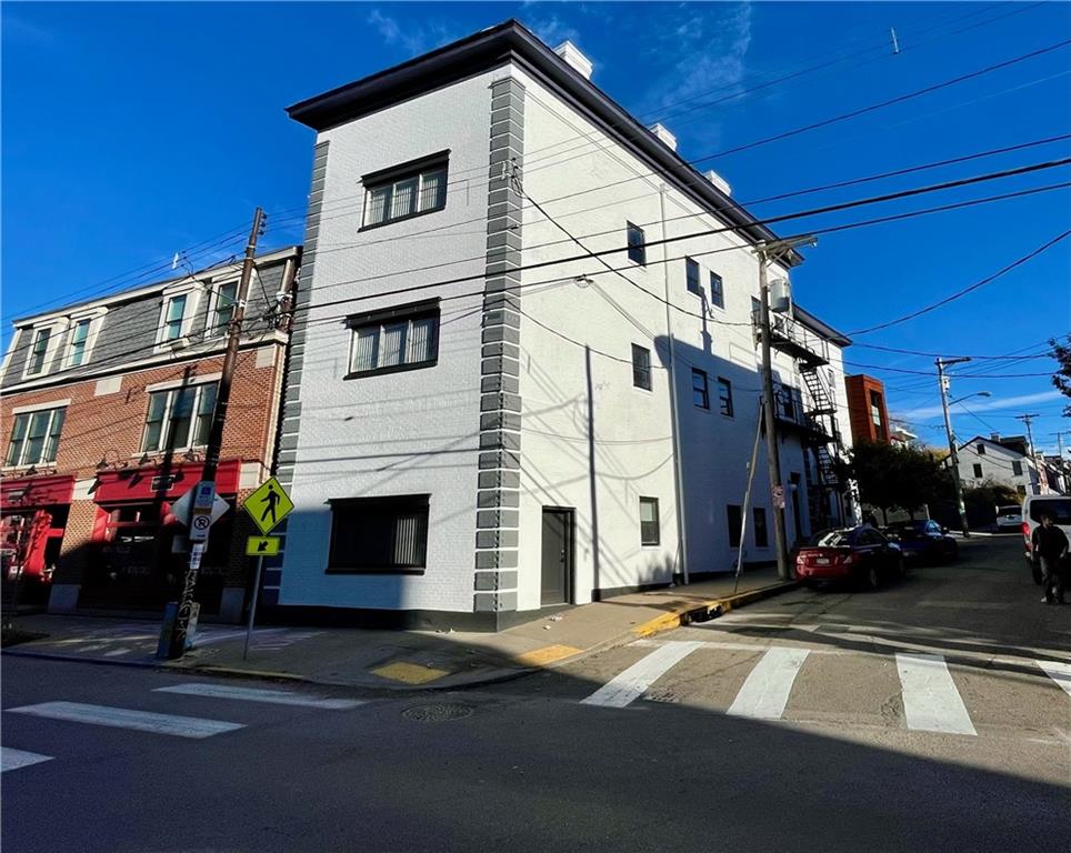 3800 Butler Street Pittsburgh, PA 15201 - Photo 2 of 21 a front view of a building with street