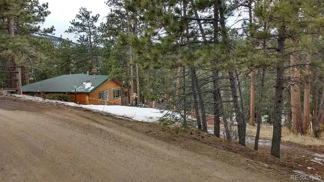 a view of a house with a street