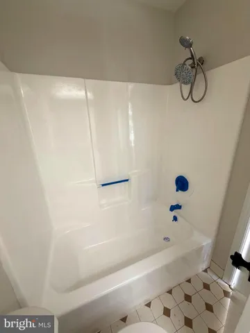 a bathroom with a bathtub