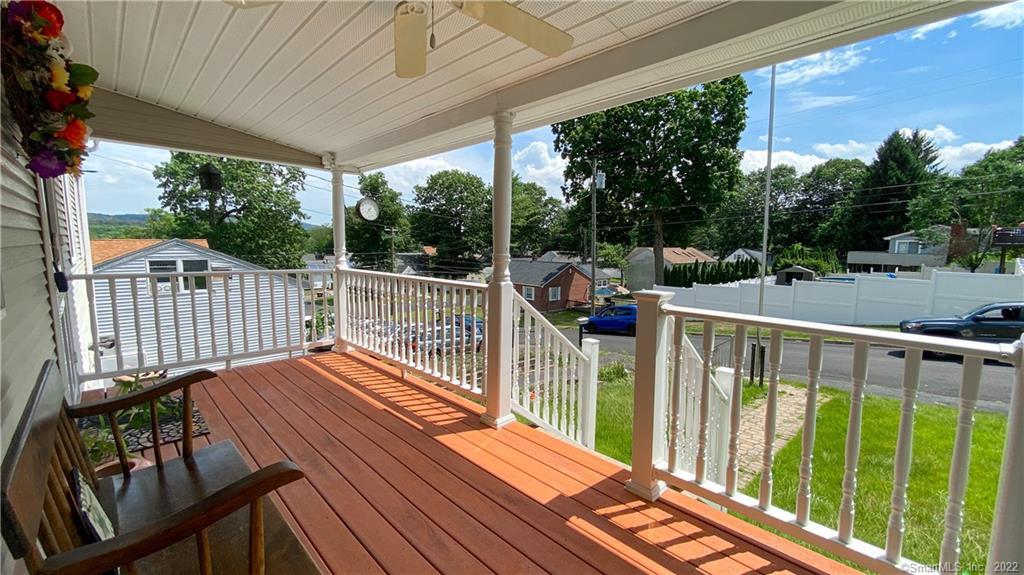 39 Ridgeview Road Meriden, CT 06451 - Photo 1 of 1 Welcome to the Beaver Pond neighborhood of Meriden - relaxing on your oversize 'rocking chair' porch!