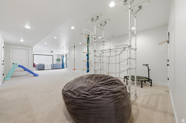 4331 West 475 South West Point, UT 84015 - Photo 30 of 46 Recessed lighting illuminates a spacious room featuring light-toned carpeting