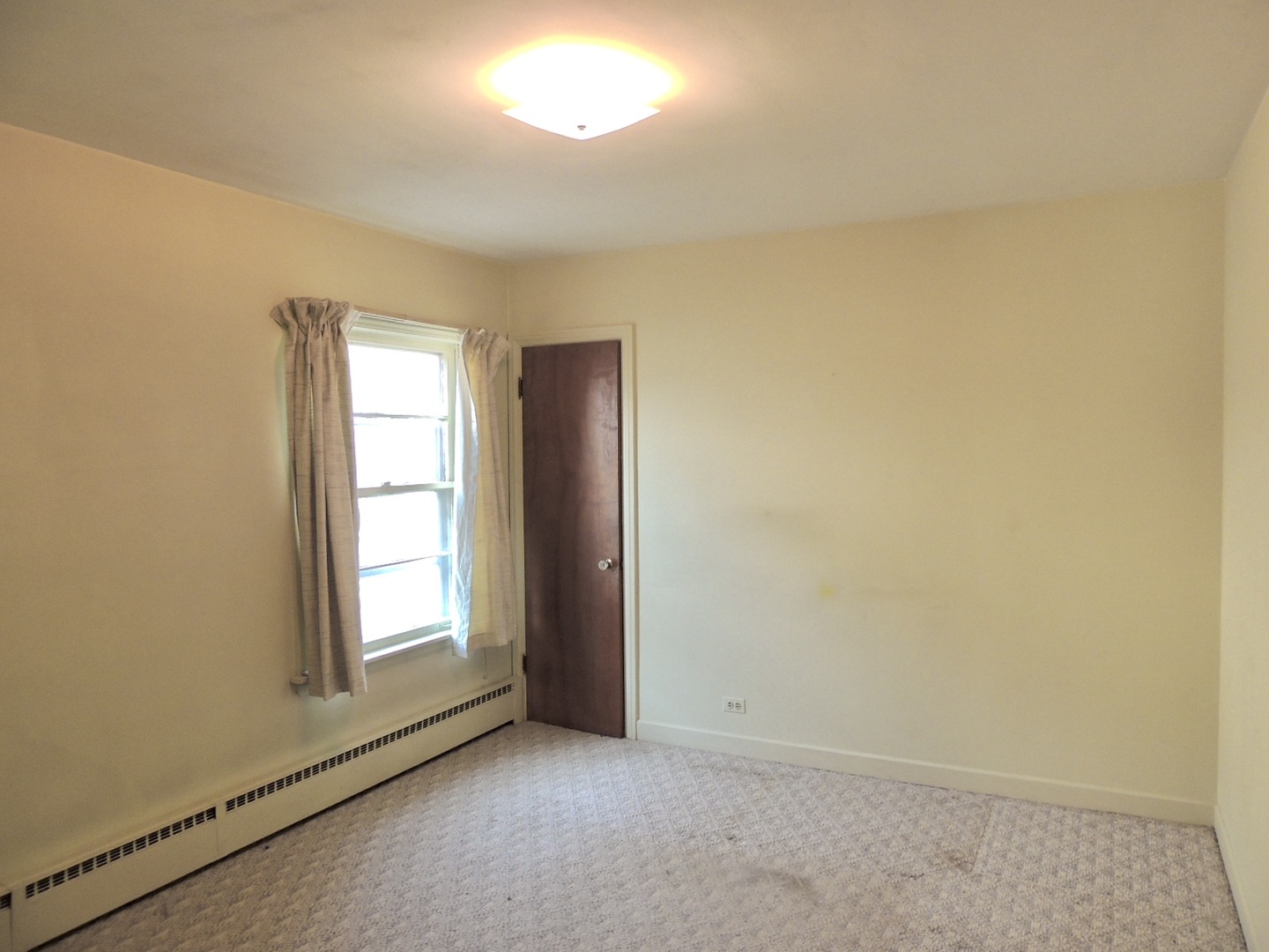 2202 River Road River Grove, IL 60171 - Photo 18 of 33 an empty room with windows