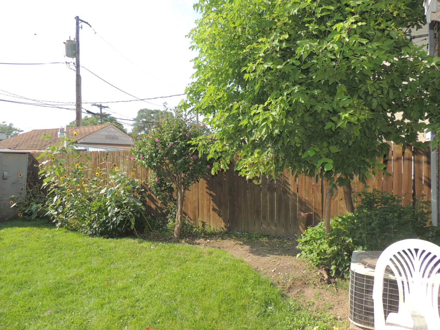 2202 River Road River Grove, IL 60171 - Photo 9 of 33 a front view of a house with garden