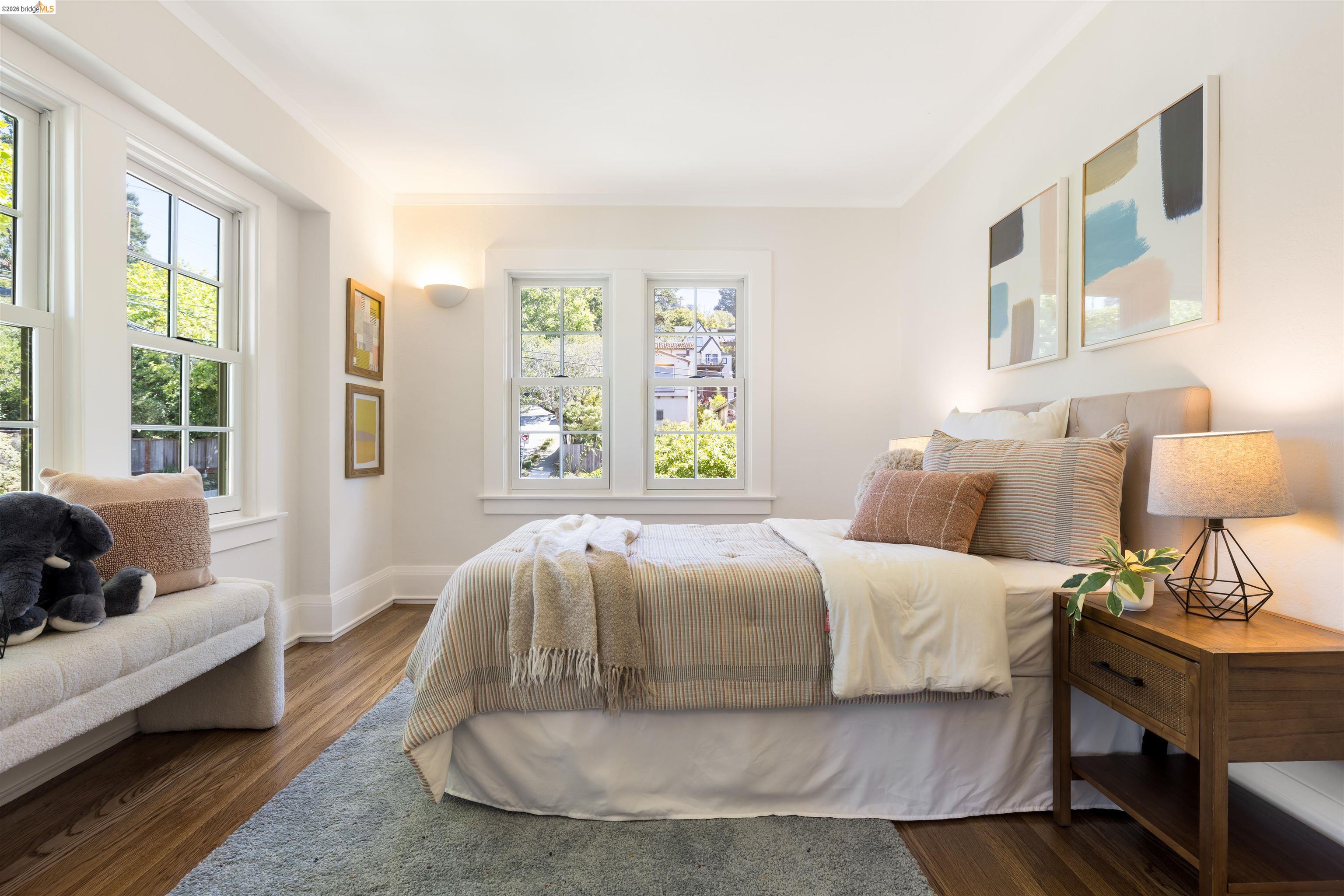 900 Euclid Avenue Berkeley, CA 94708 - Photo 29 of 54 a bedroom with a bed and wooden floor