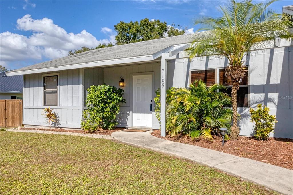 7109 Java Drive Sarasota, FL 34241 - Photo 2 of 23 front view of a house with a yard