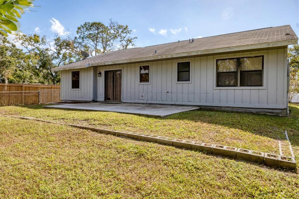 7109 Java Drive Sarasota, FL 34241 - Photo 22 of 23 a view of house with backyard and swimming pool
