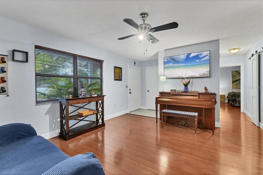 7109 Java Drive Sarasota, FL 34241 - Photo 3 of 23 a living room with furniture and a window