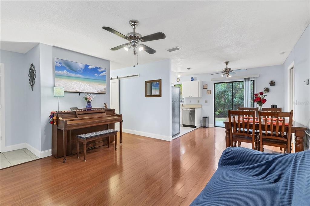 7109 Java Drive Sarasota, FL 34241 - Photo 6 of 23 a living room with furniture and a wooden floor