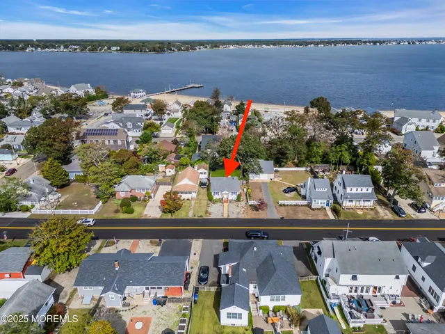 a view of swimming pool with a lake view