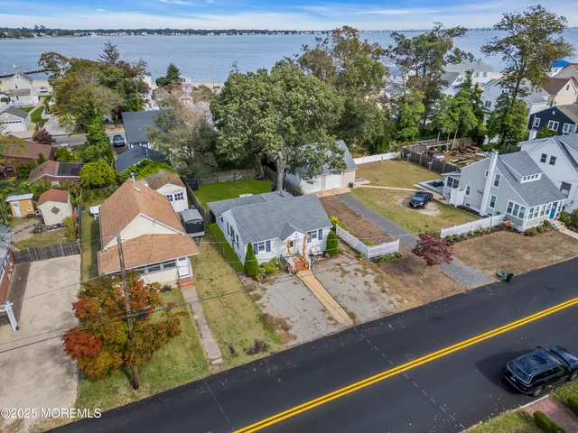 an aerial view of a house with outdoor space