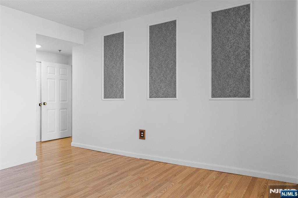 100 Old Palisade Road, Unit 3215 Fort Lee, NJ 07024 - Photo 26 of 43 wooden floor in an empty room