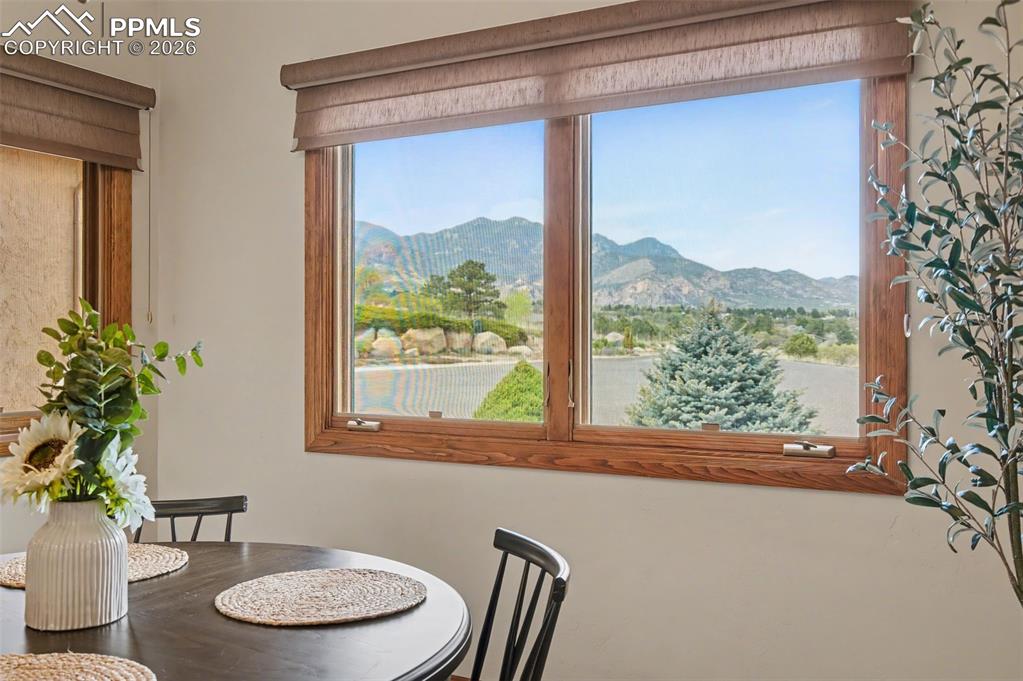 4215 Star Ranch Road Colorado Springs, CO 80906 - Photo 23 of 44 a view of a room that has a table and a potted plant