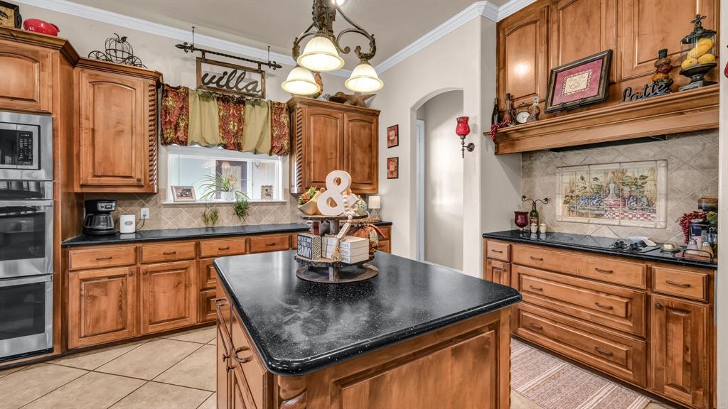 1144 B Boling Ranch North Road Azle, TX 76020 - Photo 11 of 40 a kitchen with stainless steel appliances granite countertop a sink a stove and refrigerator