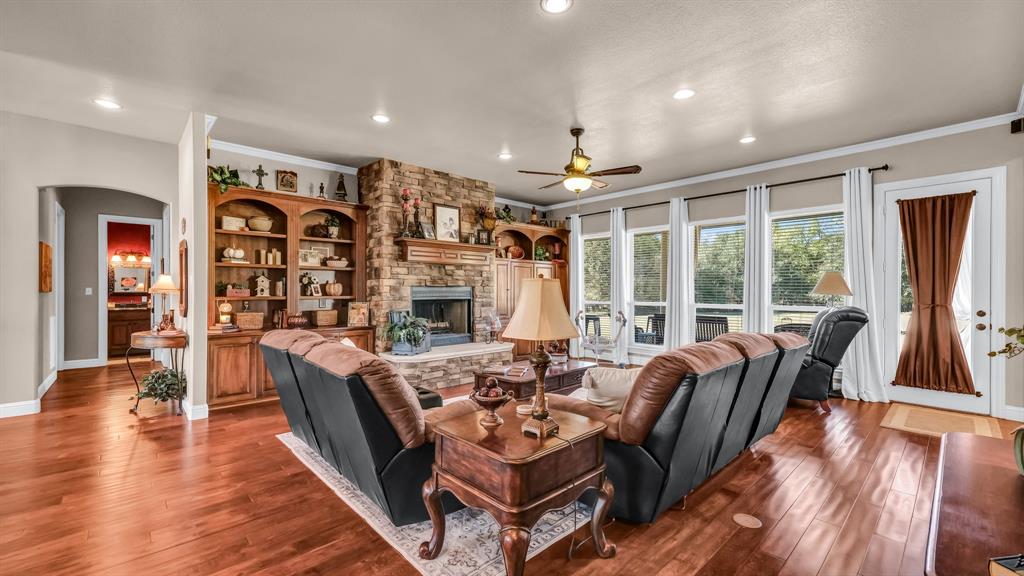 1144 B Boling Ranch North Road Azle, TX 76020 - Photo 2 of 40 a living room with furniture large window and wooden floor