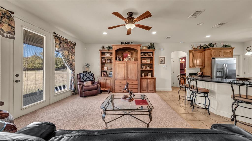 1144 B Boling Ranch North Road Azle, TX 76020 - Photo 27 of 40 a living room with furniture a large window with stainless steel appliances