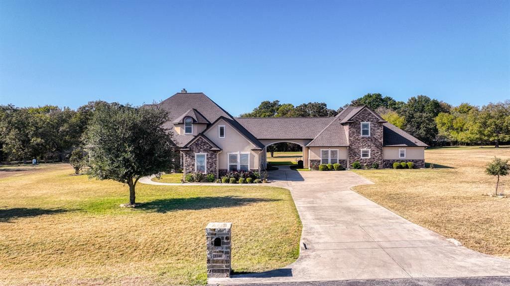 1144 B Boling Ranch North Road Azle, TX 76020 - Photo 39 of 40 a front view of a house with a yard