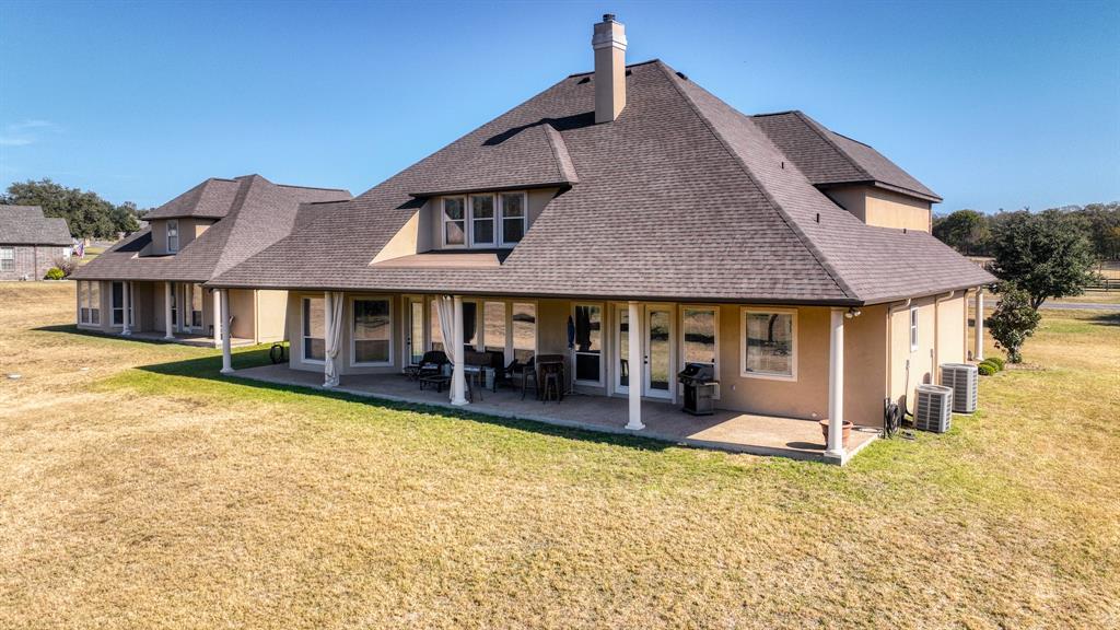 1144 B Boling Ranch North Road Azle, TX 76020 - Photo 40 of 40 a front view of a house with a yard outdoor seating and garage