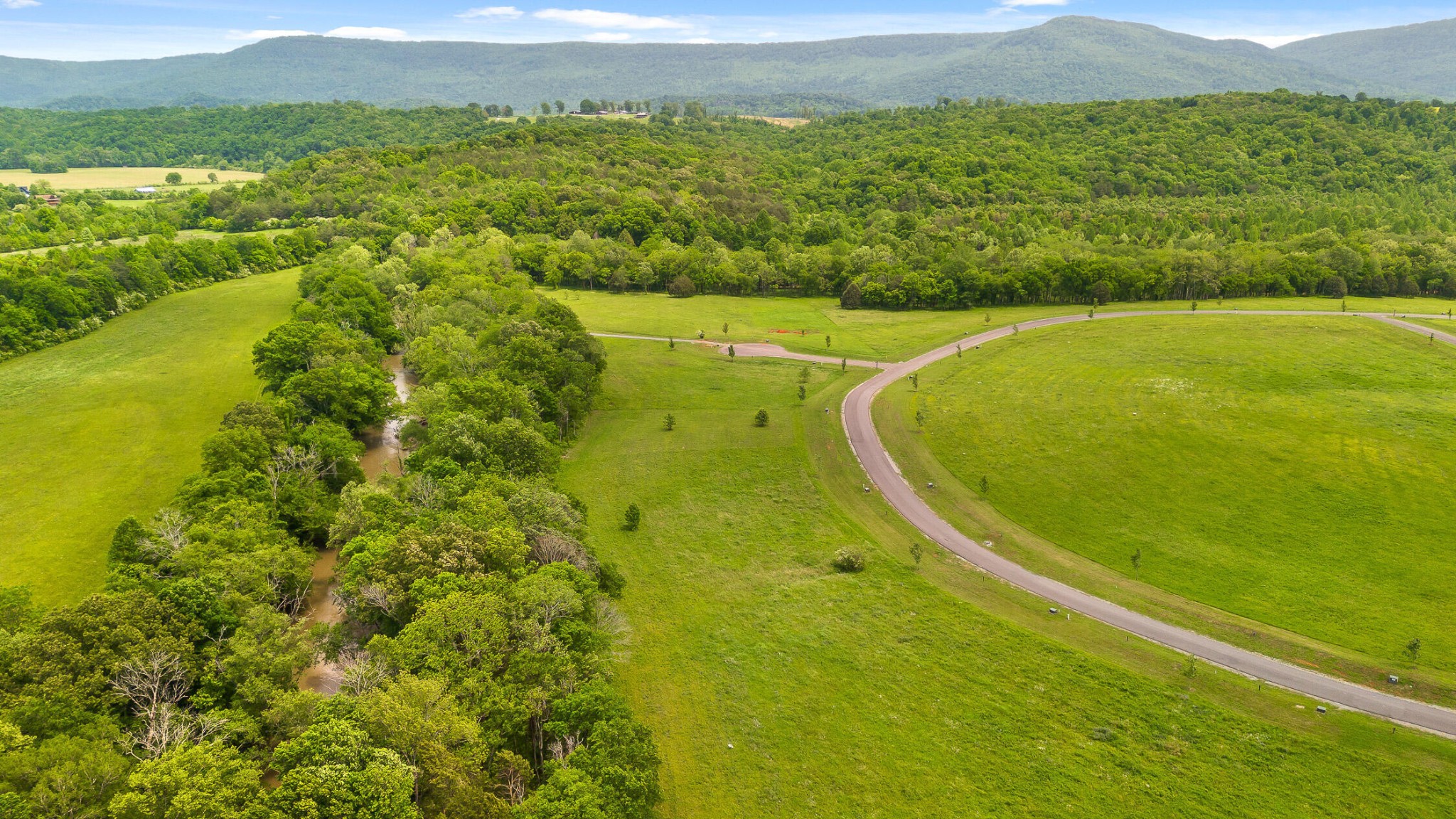 35 River Ridge Drive Dunlap, TN 37327 - Photo 22 of 35 a view of a field with an ocean