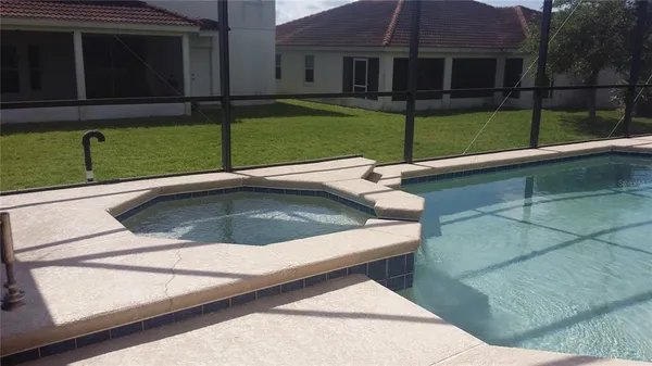 a view of a house with a sink and a yard