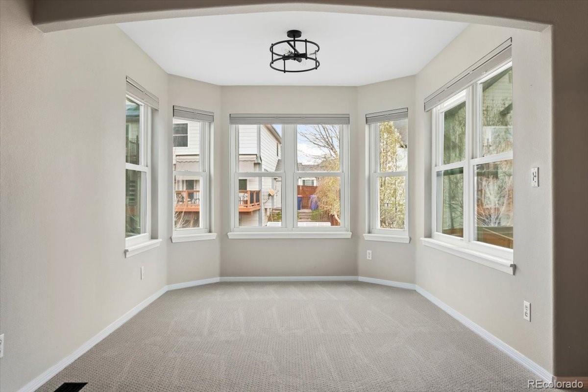 3385 White Oak Lane Highlands Ranch, CO 80129 - Photo 23 of 36 an empty room with windows
