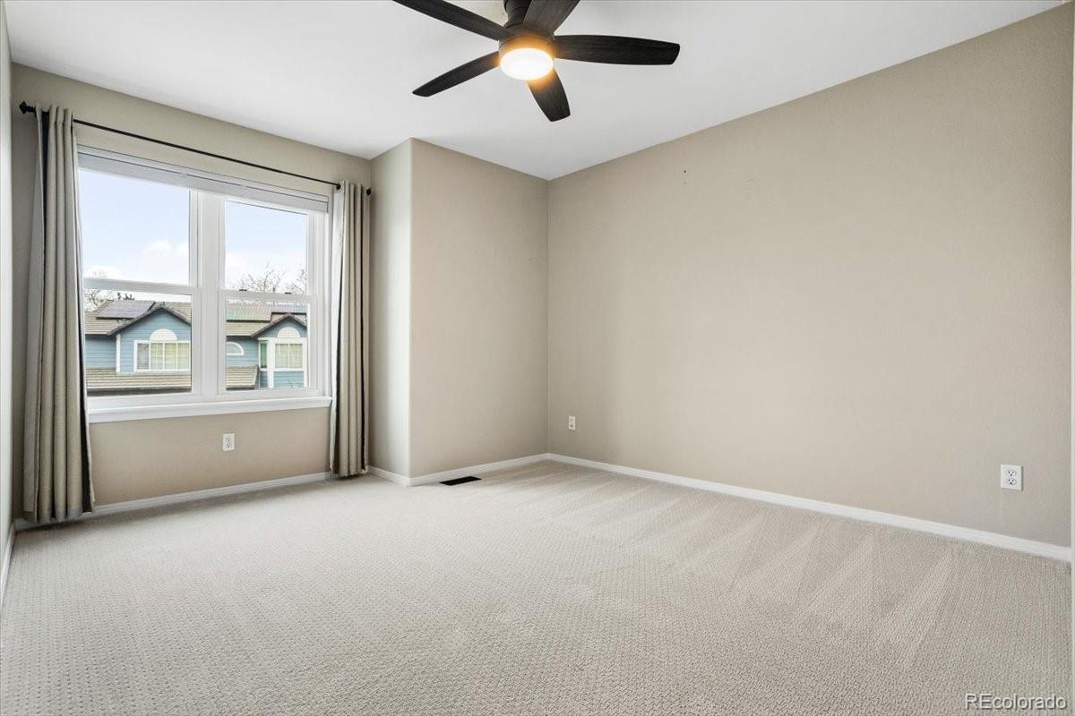 3385 White Oak Lane Highlands Ranch, CO 80129 - Photo 27 of 36 a view of an empty room with a window