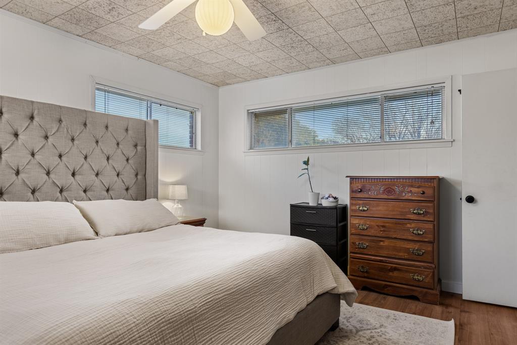 910 South Harrison Street West, TX 76691 - Photo 21 of 39 a bedroom with a bed and a cabinet