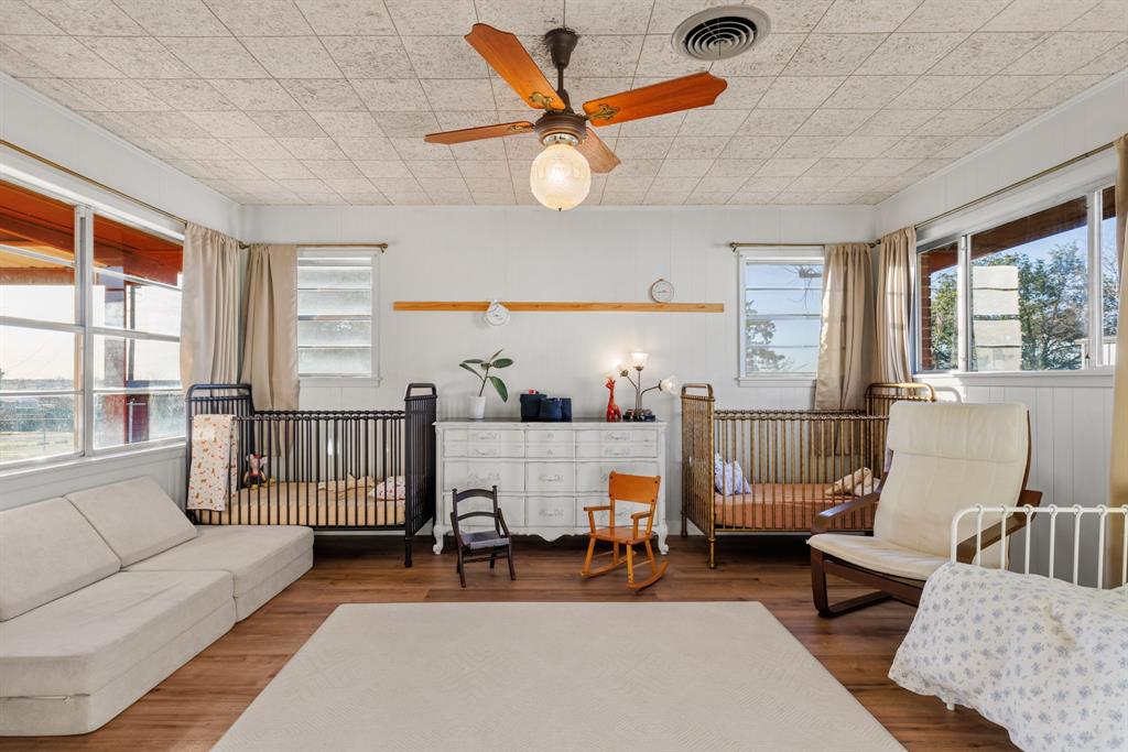 910 South Harrison Street West, TX 76691 - Photo 26 of 39 a living room with furniture and a large window