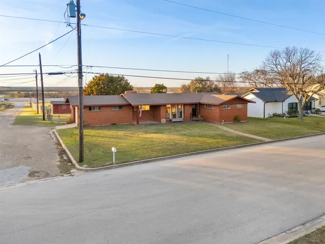 a view of a house with a park