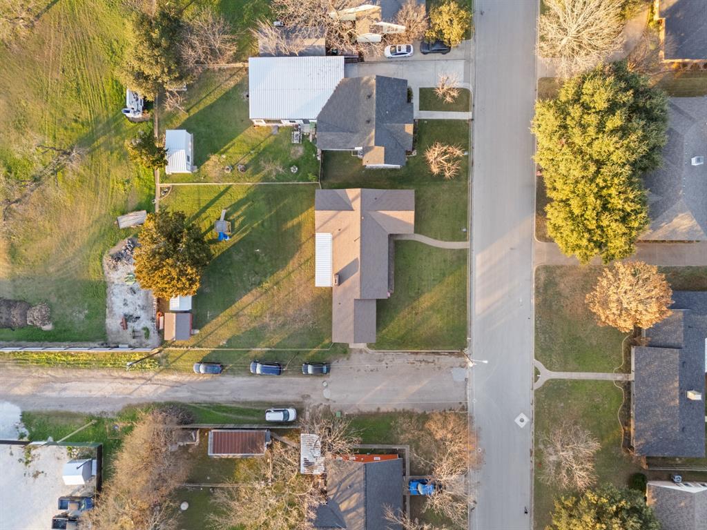 910 South Harrison Street West, TX 76691 - Photo 35 of 39 an aerial view of a residential houses with outdoor space
