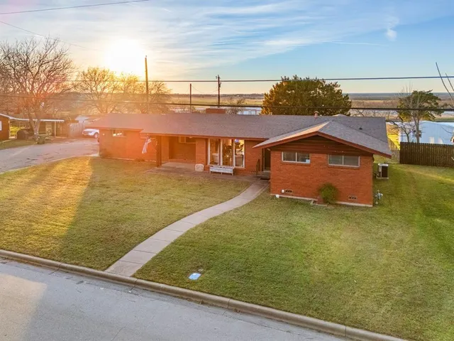 an aerial view of a garden with an outdoor space