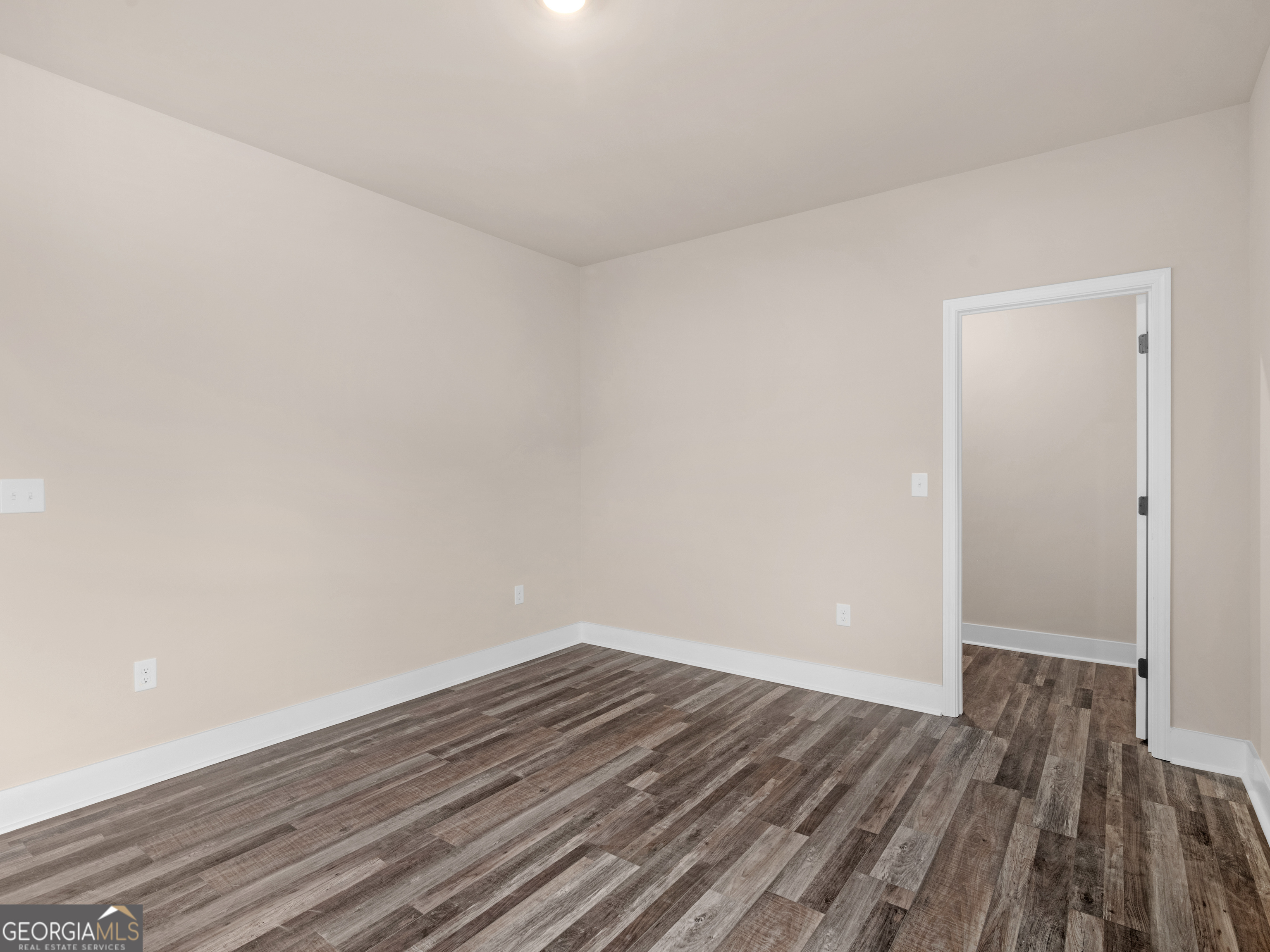 160 Loyd Road Mansfield, GA 30056 - Photo 38 of 53 a view of an empty room with wooden floor