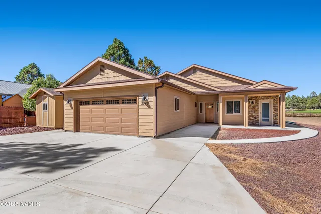a front view of a house with yard