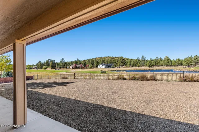 a view of a swimming pool and outdoor space