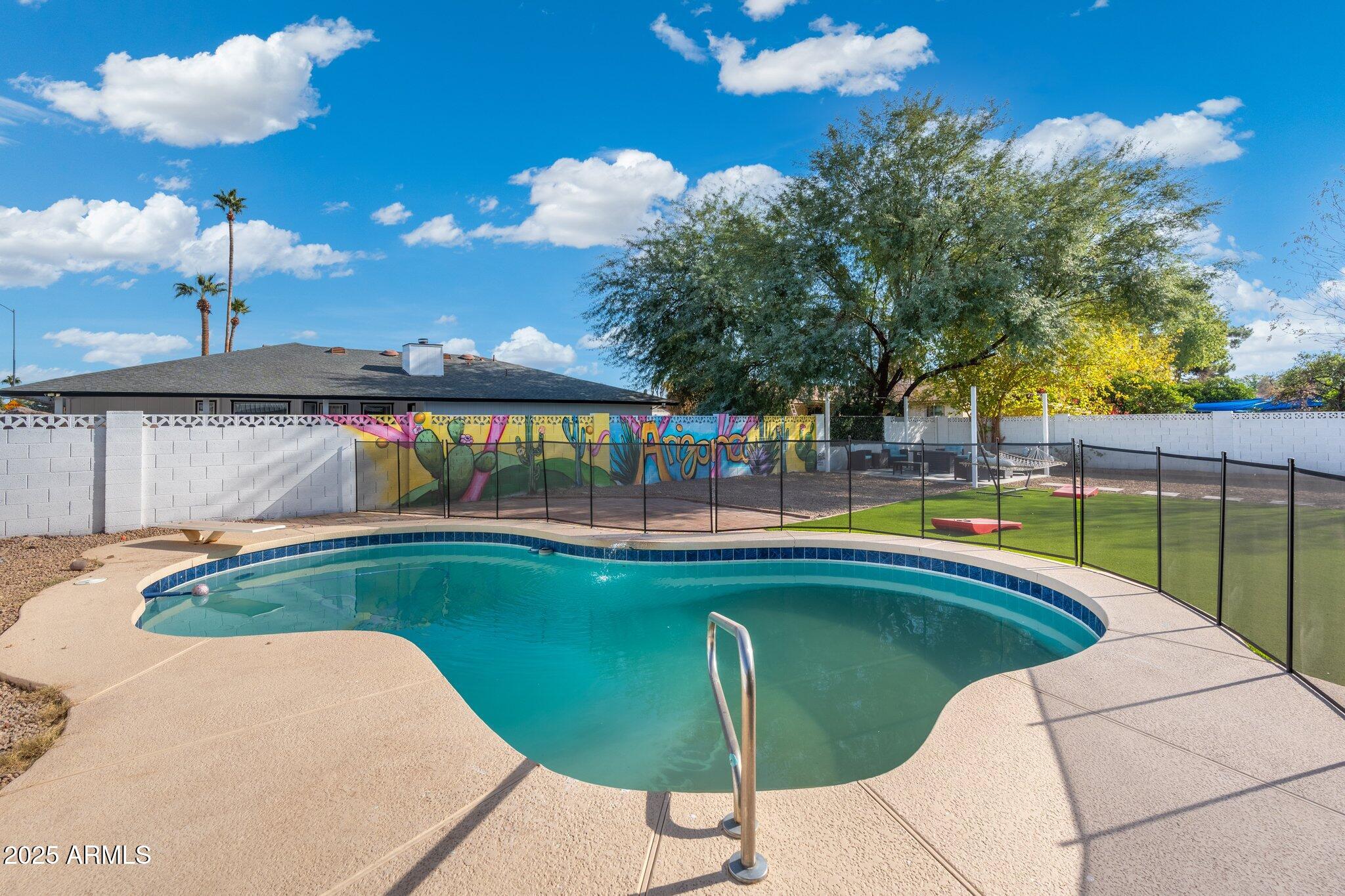 1759 North Spring Circle Mesa, AZ 85203 - Photo 19 of 69 a view of swimming pool with seating space