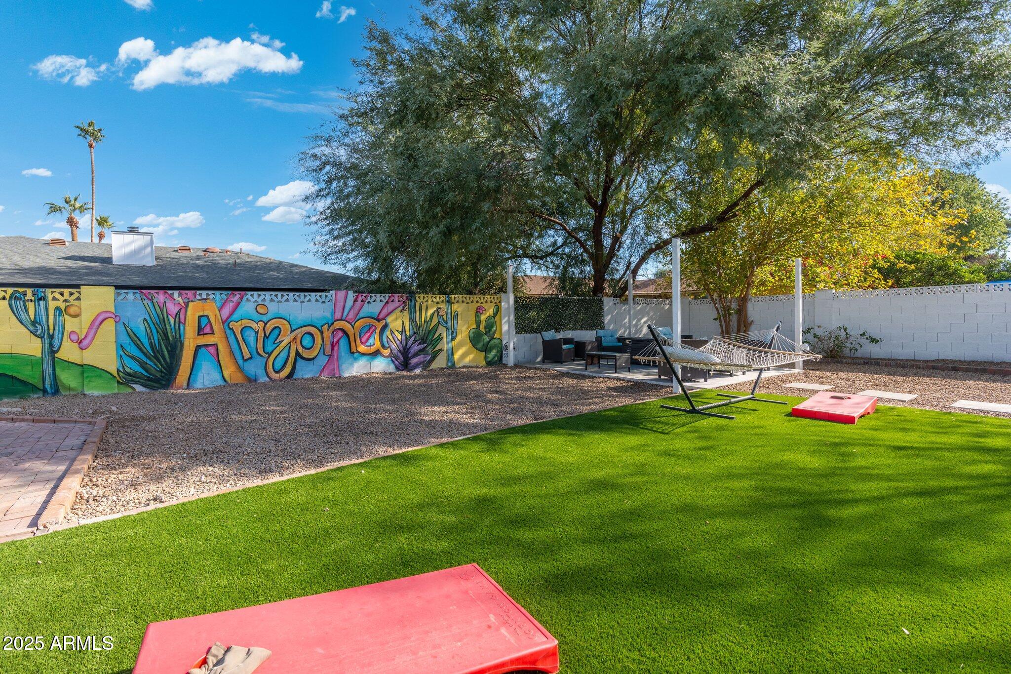 1759 North Spring Circle Mesa, AZ 85203 - Photo 32 of 69 a view of outdoor space with garden and entertaining space