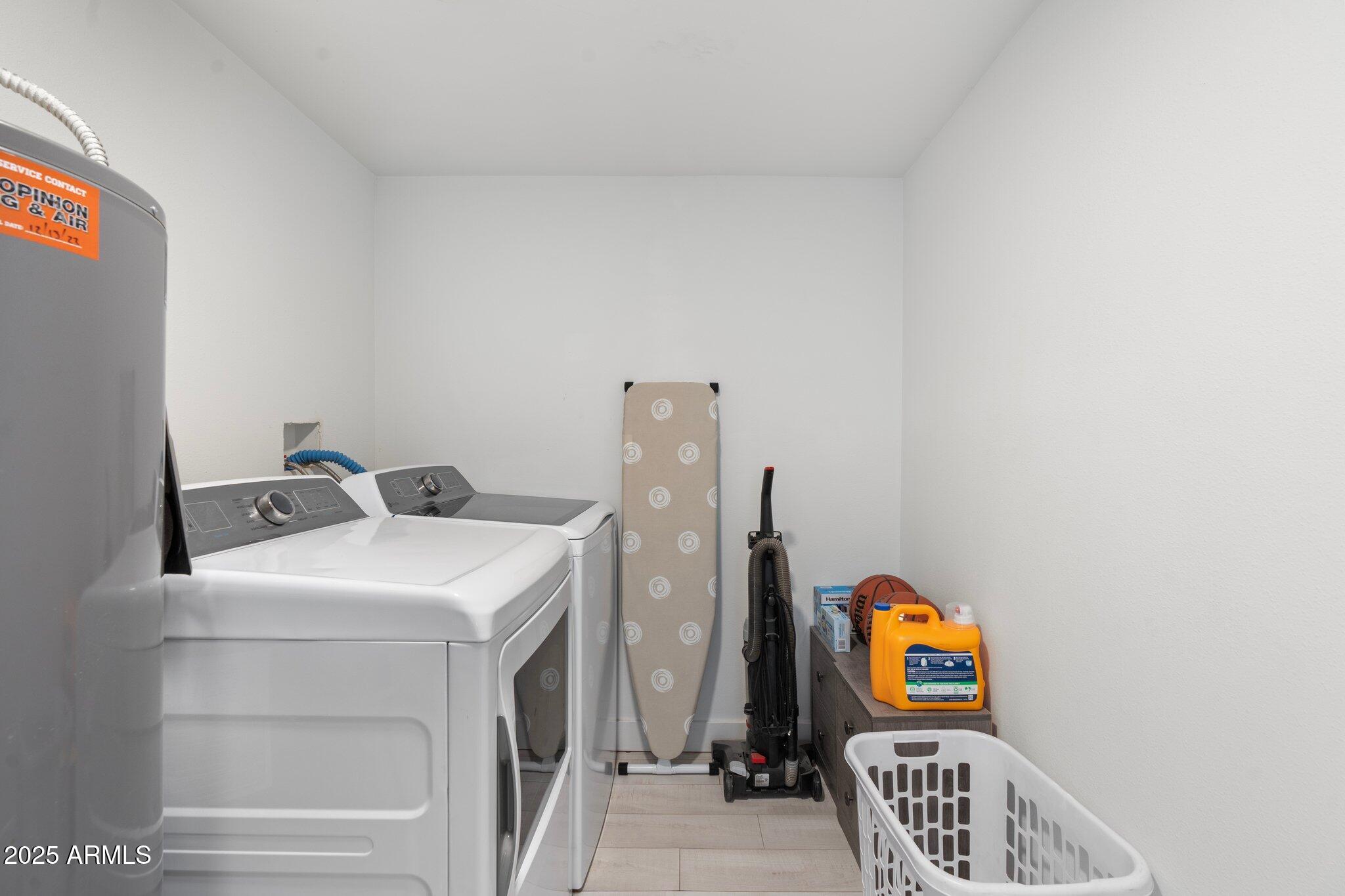 1759 North Spring Circle Mesa, AZ 85203 - Photo 44 of 69 a utility room with dryer and washer