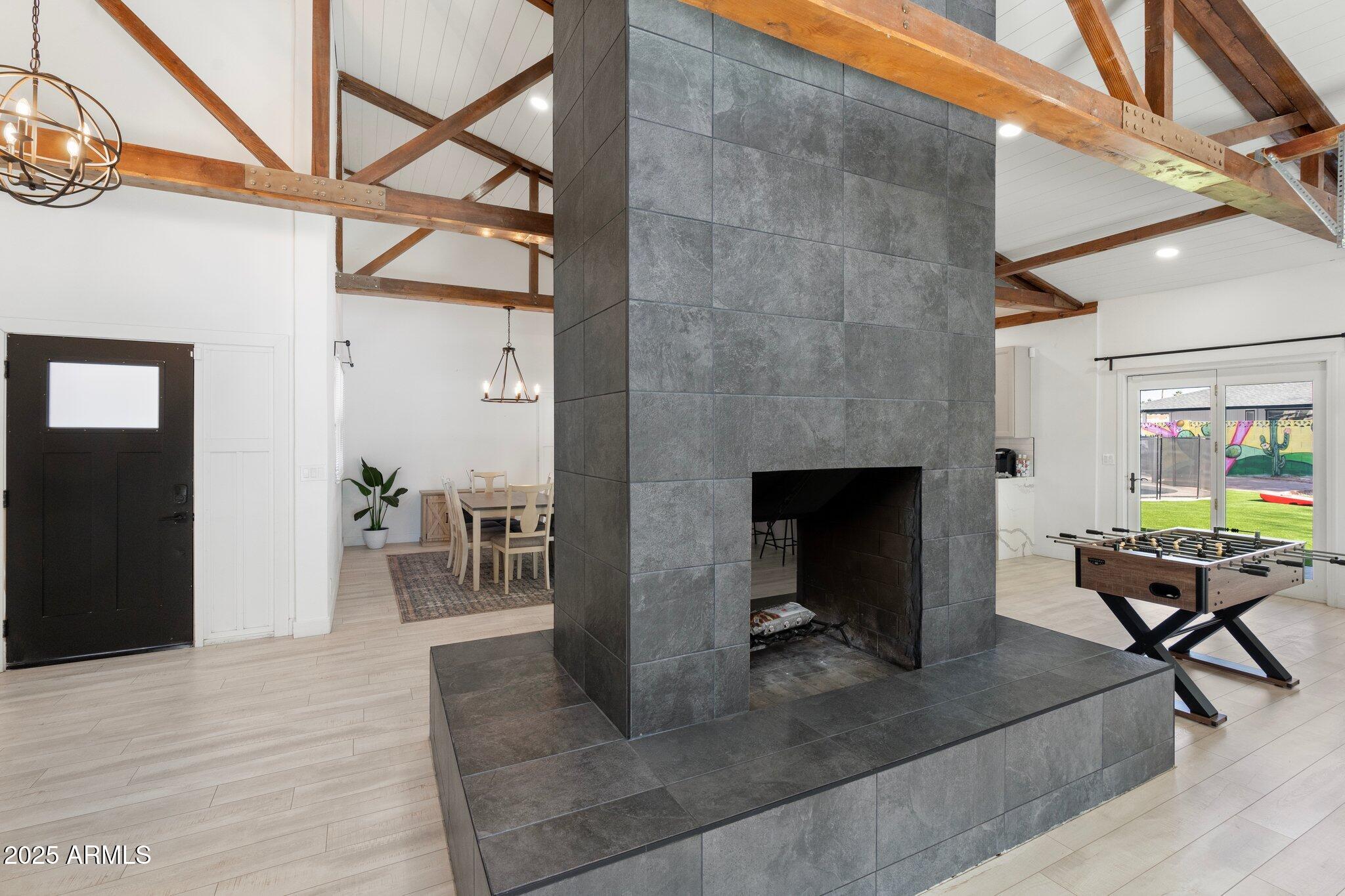1759 North Spring Circle Mesa, AZ 85203 - Photo 54 of 69 a living room with furniture and a fireplace