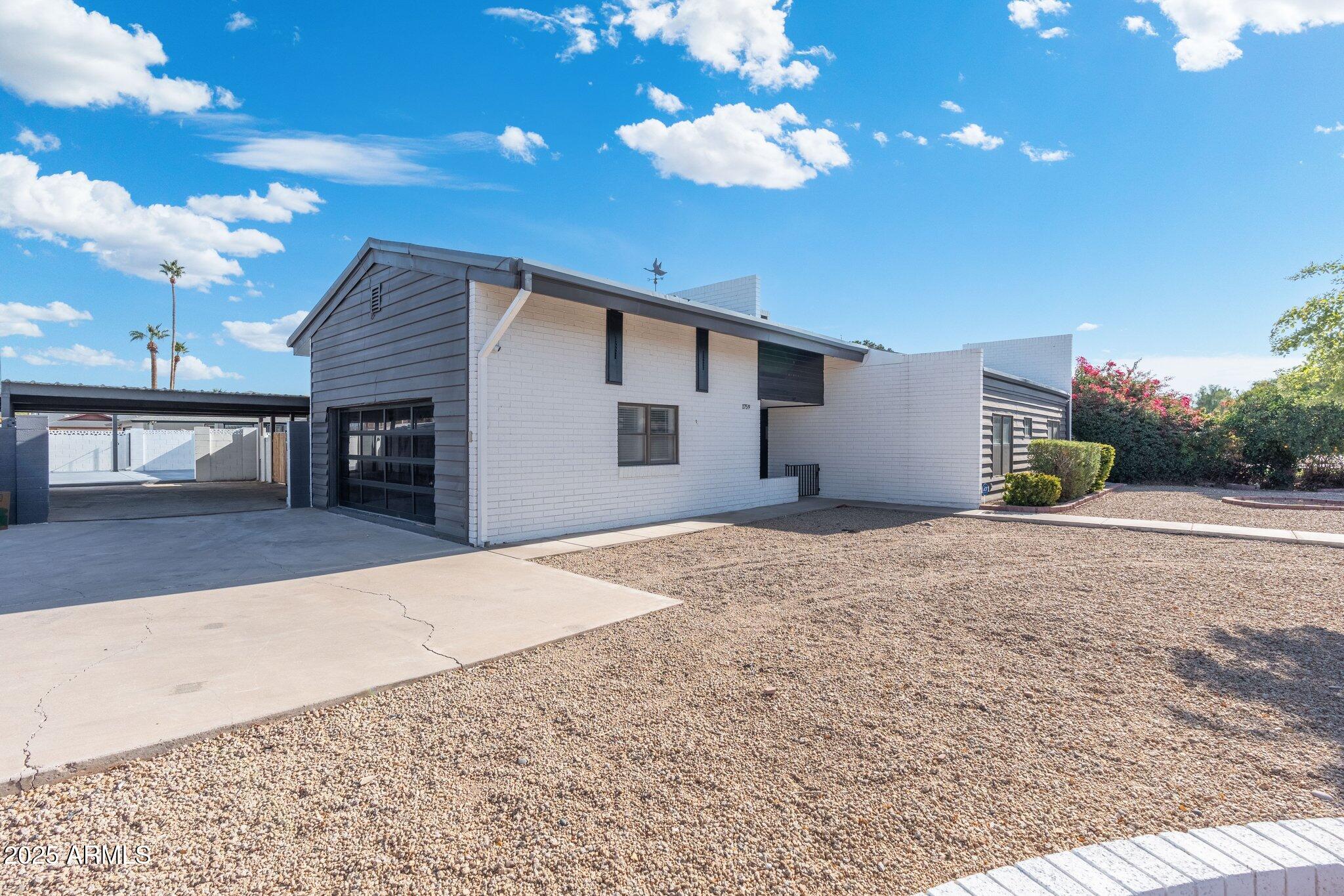 1759 North Spring Circle Mesa, AZ 85203 - Photo 68 of 69 a house view with a outdoor space