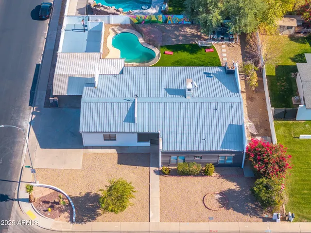 a view of a swimming pool and deck