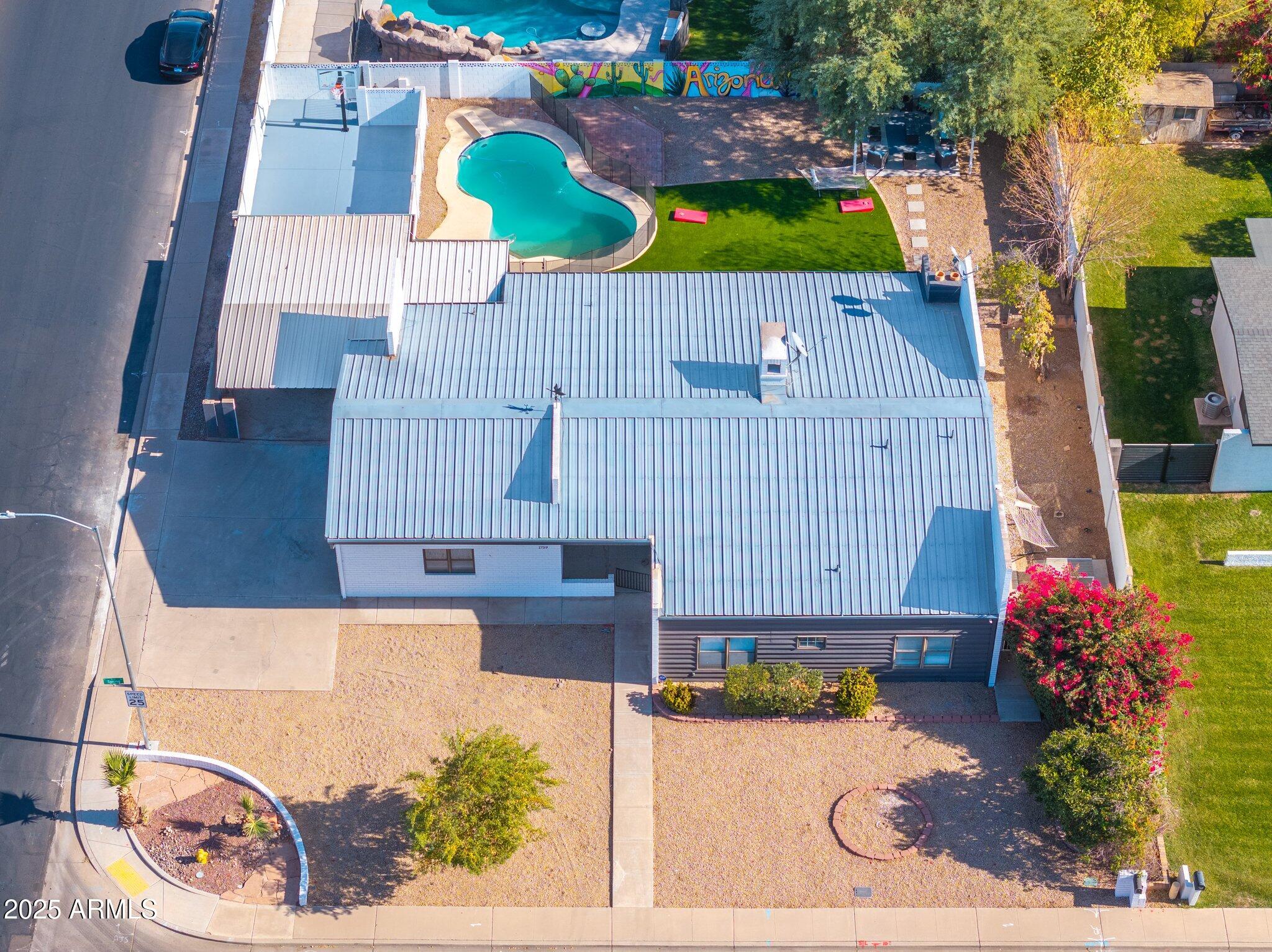 1759 North Spring Circle Mesa, AZ 85203 - Photo 8 of 69 62-web-or-mls-DJI_20241208124648_0020_D-