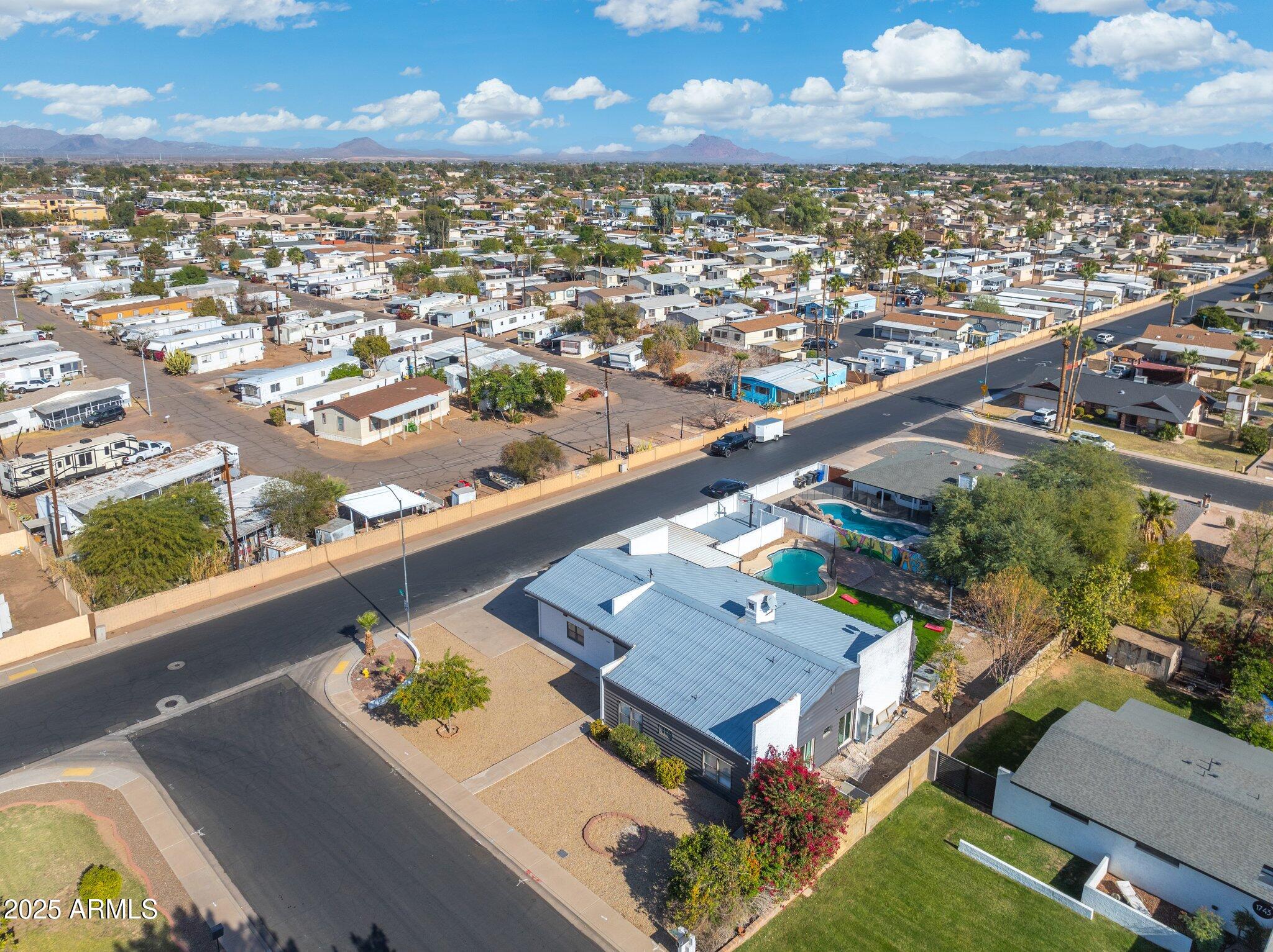 1759 North Spring Circle Mesa, AZ 85203 - Photo 9 of 69 an aerial view of residential houses with outdoor space