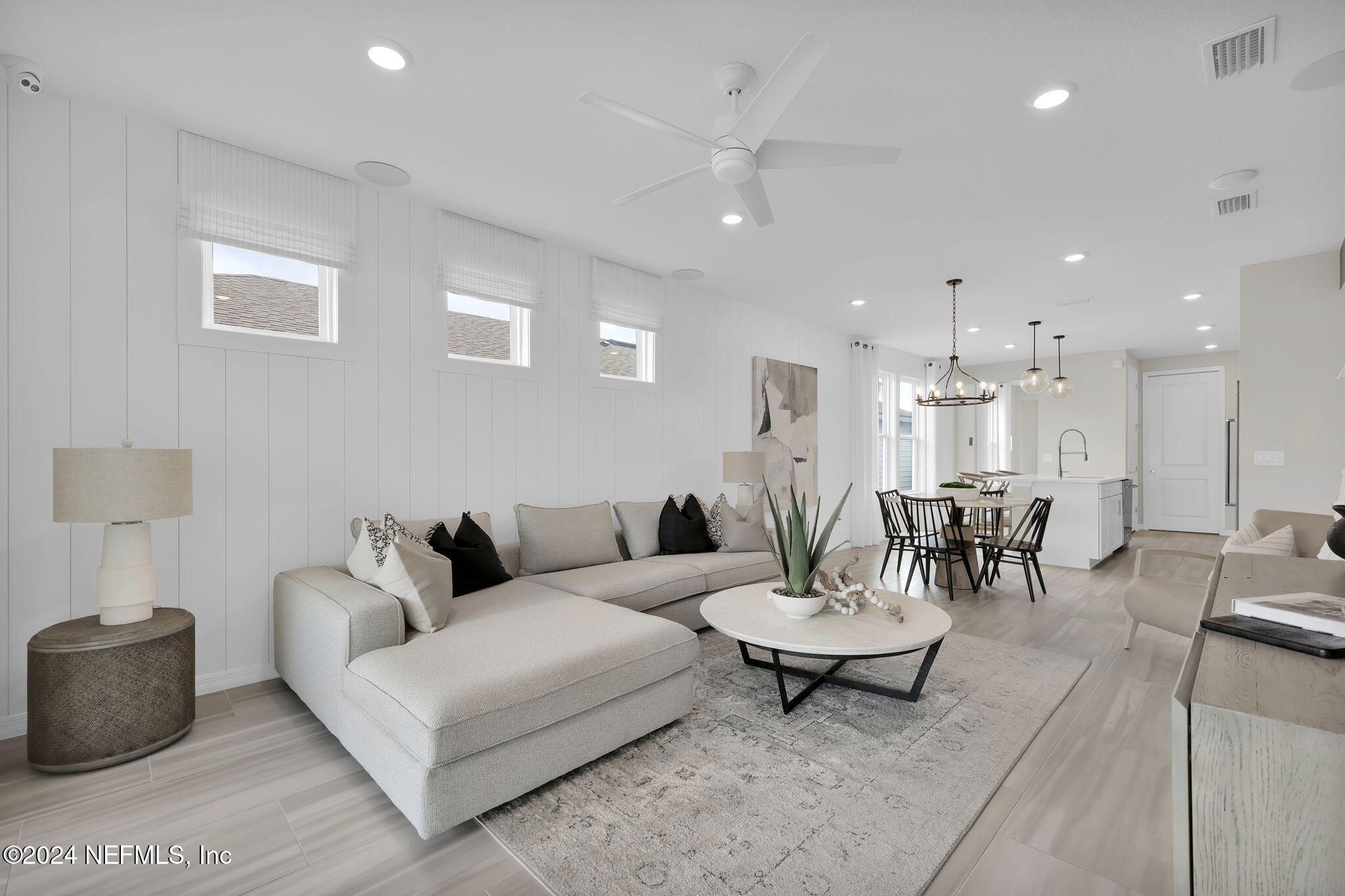 307 Fairlake Circle St. Augustine, FL 32092 - Photo 10 of 38 a living room with furniture and a table