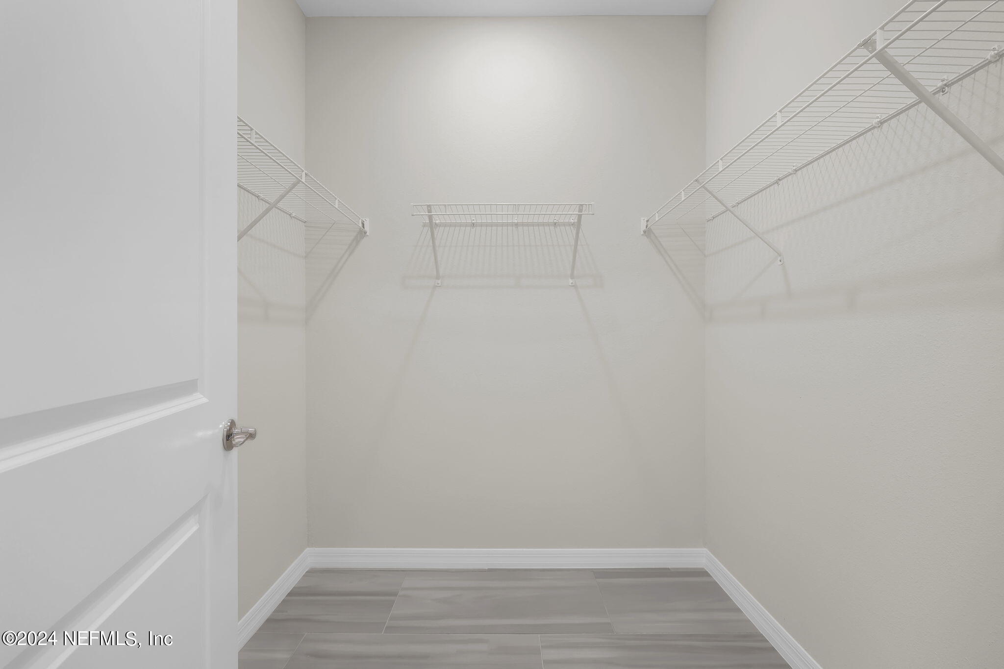 307 Fairlake Circle St. Augustine, FL 32092 - Photo 17 of 38 a view of an empty walk in closet