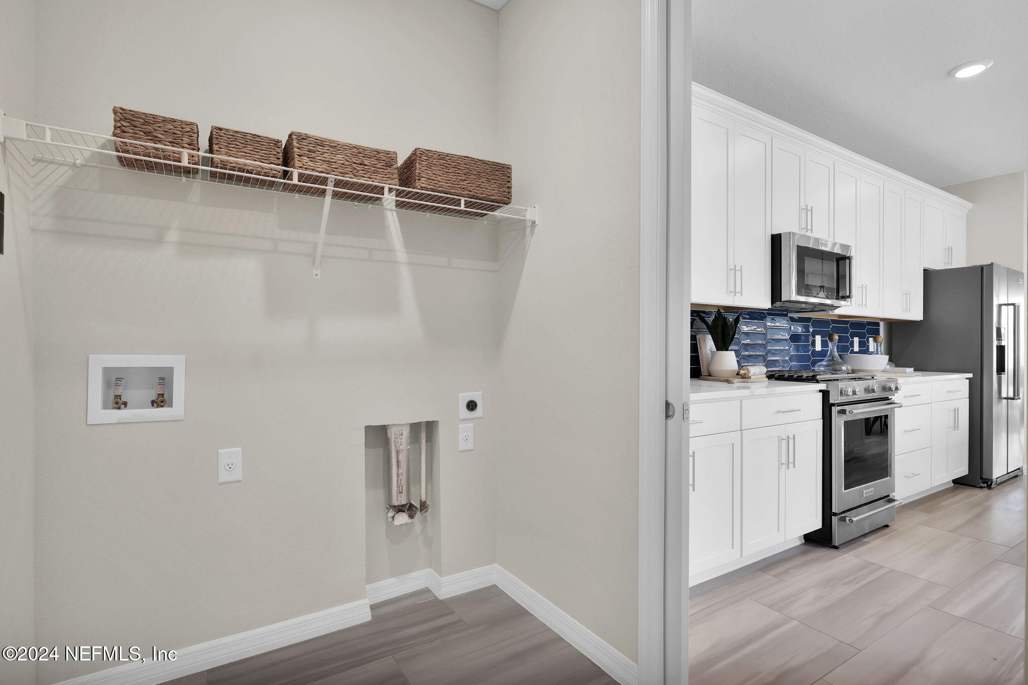 307 Fairlake Circle St. Augustine, FL 32092 - Photo 20 of 38 a view of kitchen with microwave and stove